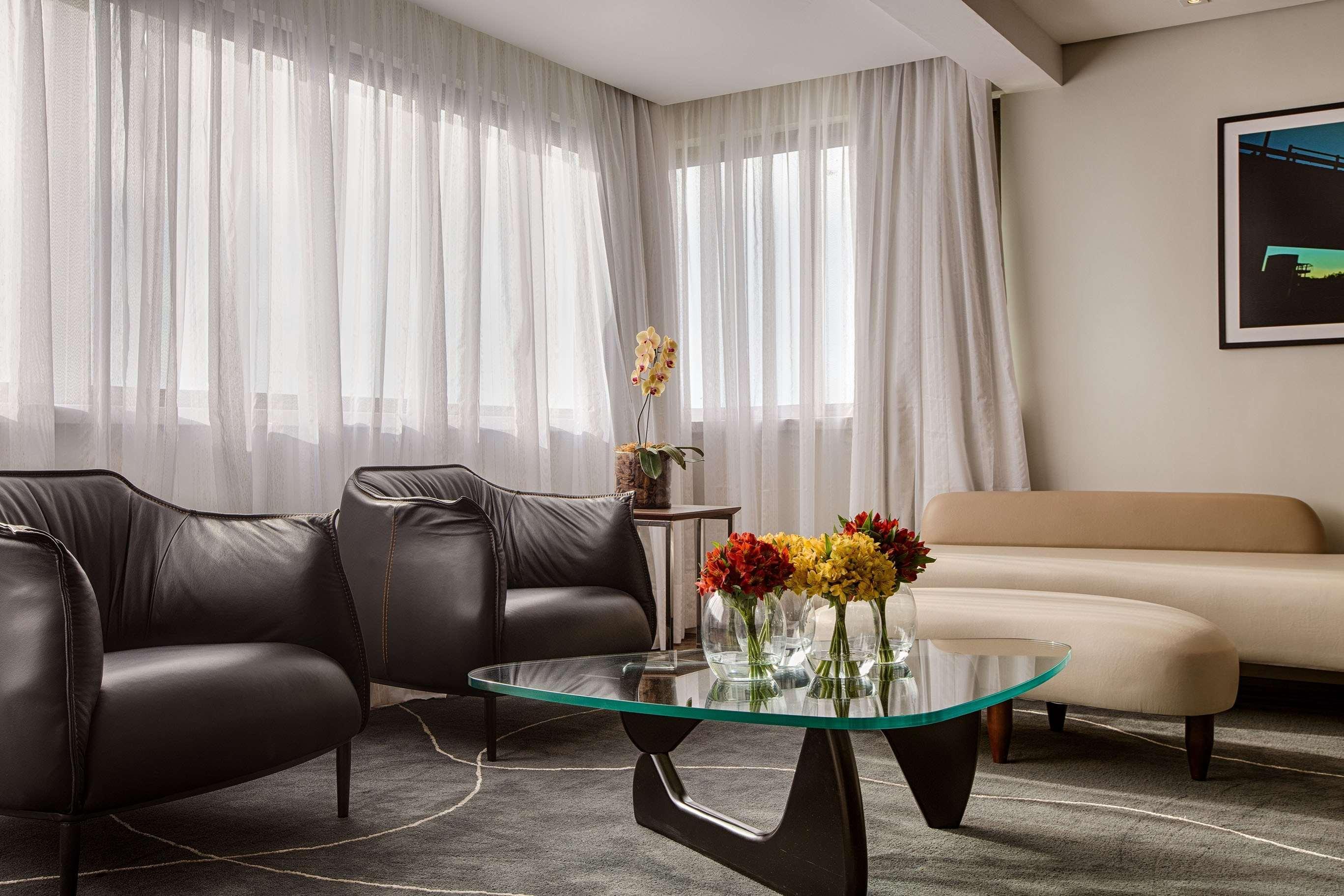 فندق راديسون بورتو أليجري بورتو أليغري المظهر الخارجي الصورة A living room at the hotel