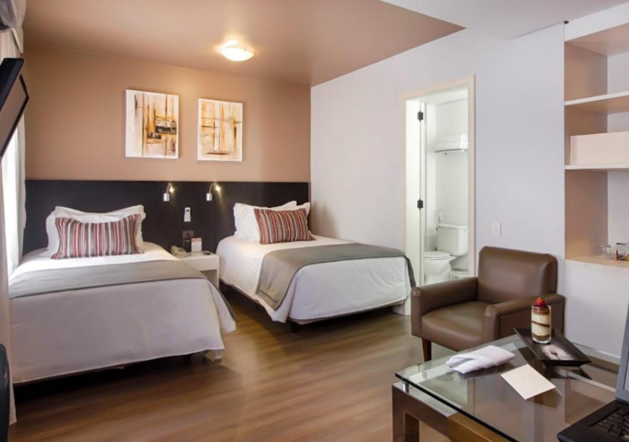 فندق راديسون بورتو أليجري بورتو أليغري المظهر الخارجي الصورة A room at the hotel