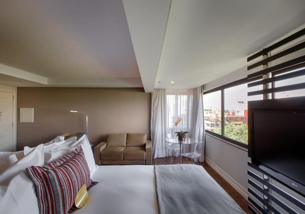 فندق راديسون بورتو أليجري بورتو أليغري المظهر الخارجي الصورة A room at the hotel